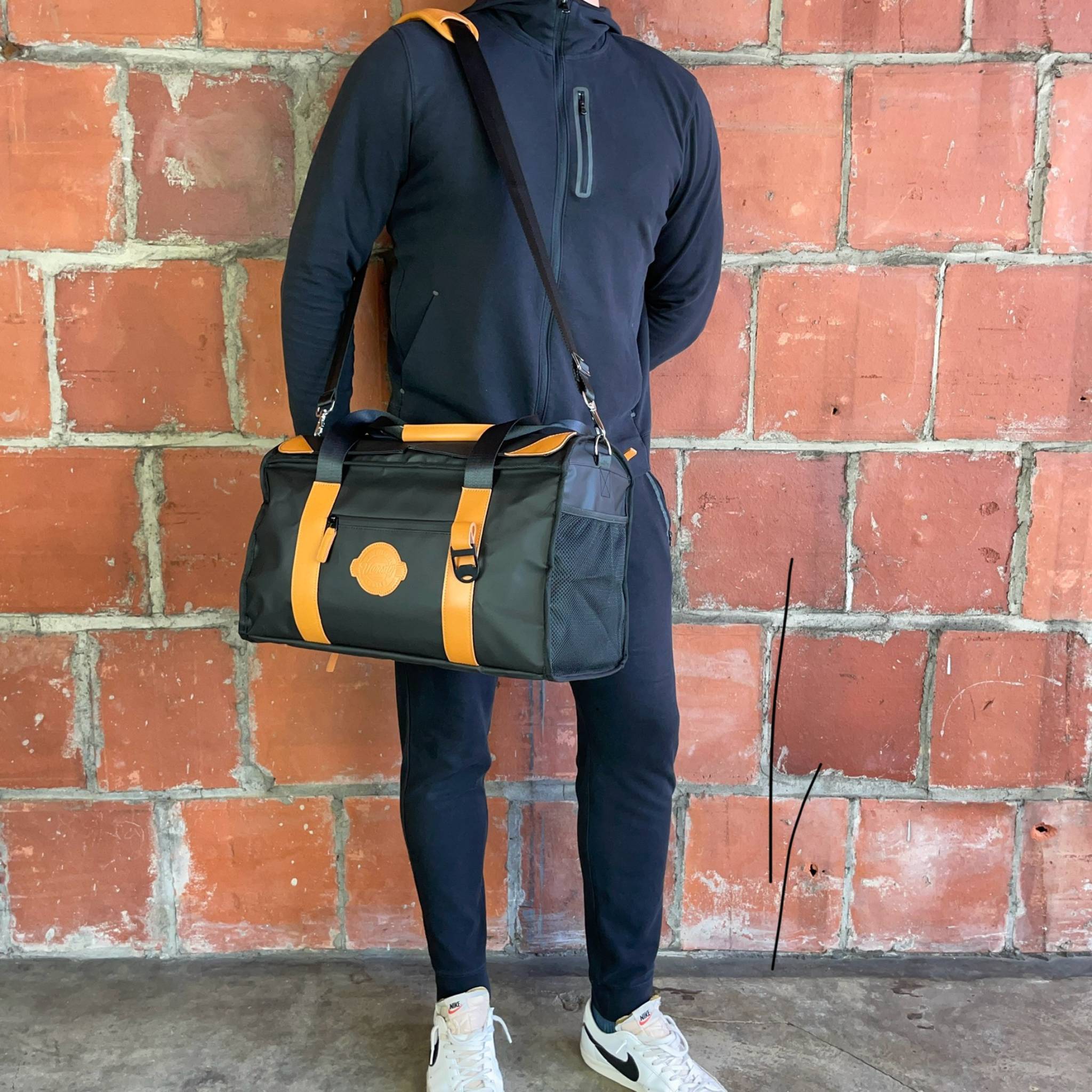 Man-Standing-With-Black-Cruiser-Golf-Course