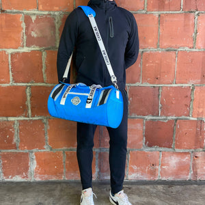 Man-standing-with-Carolina-Duffle-Cooler