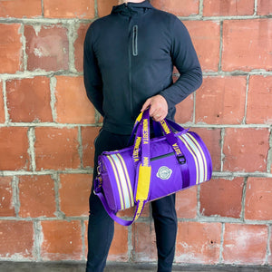Man-holding-Minnesota-duffle-cooler