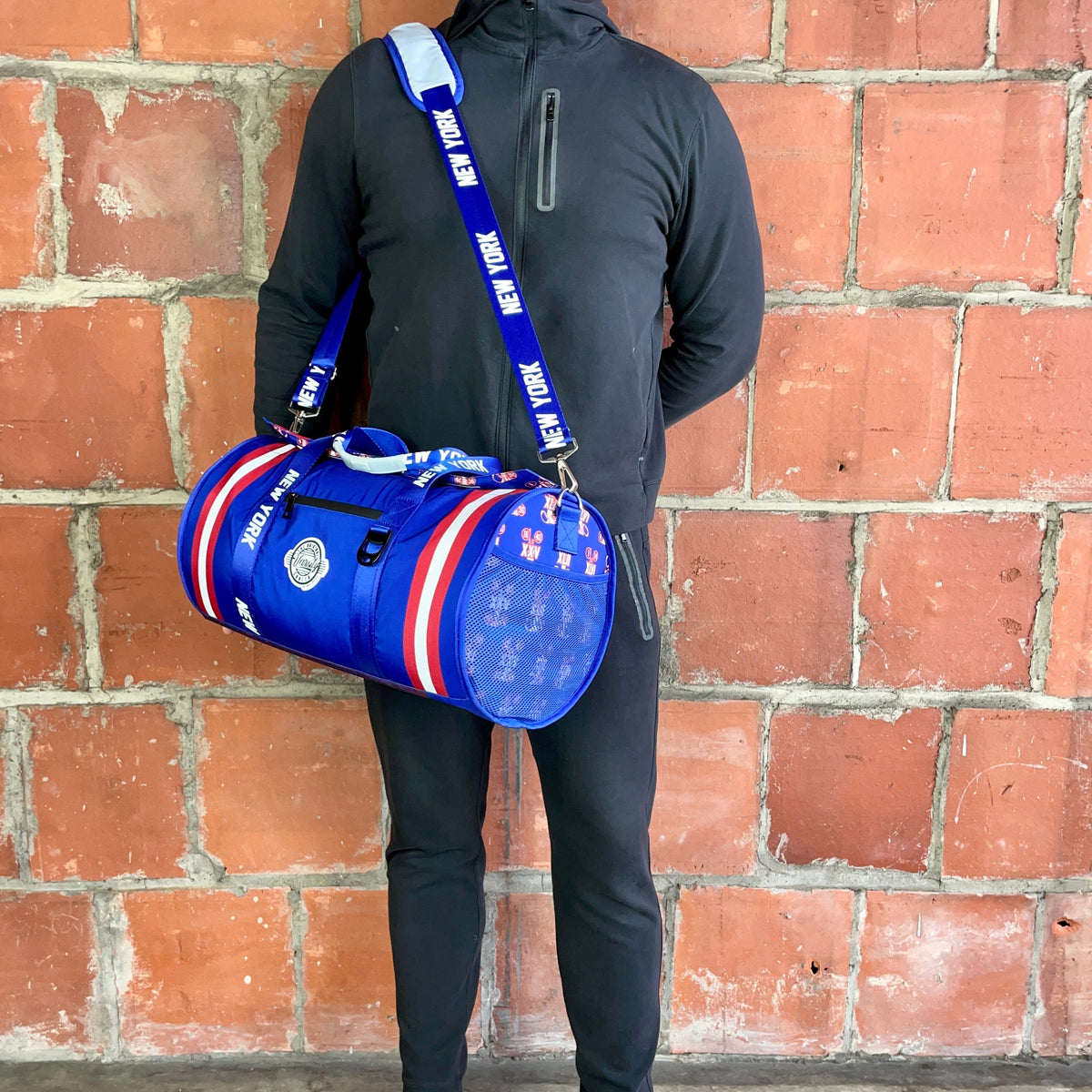Man Standing with New York Cooler Duffle Bag
