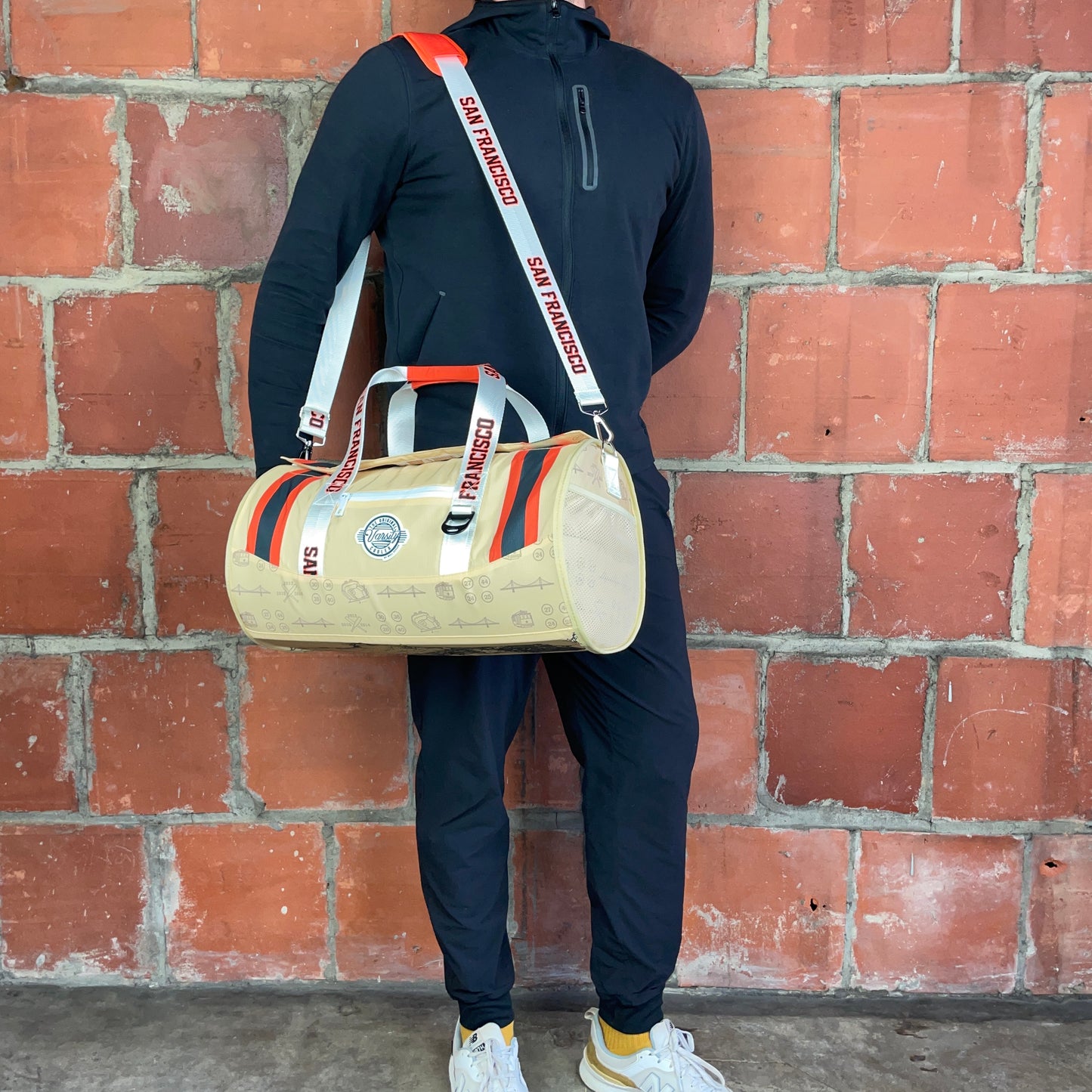 Man Standing With San Francisco Baseball Duffle Cooler