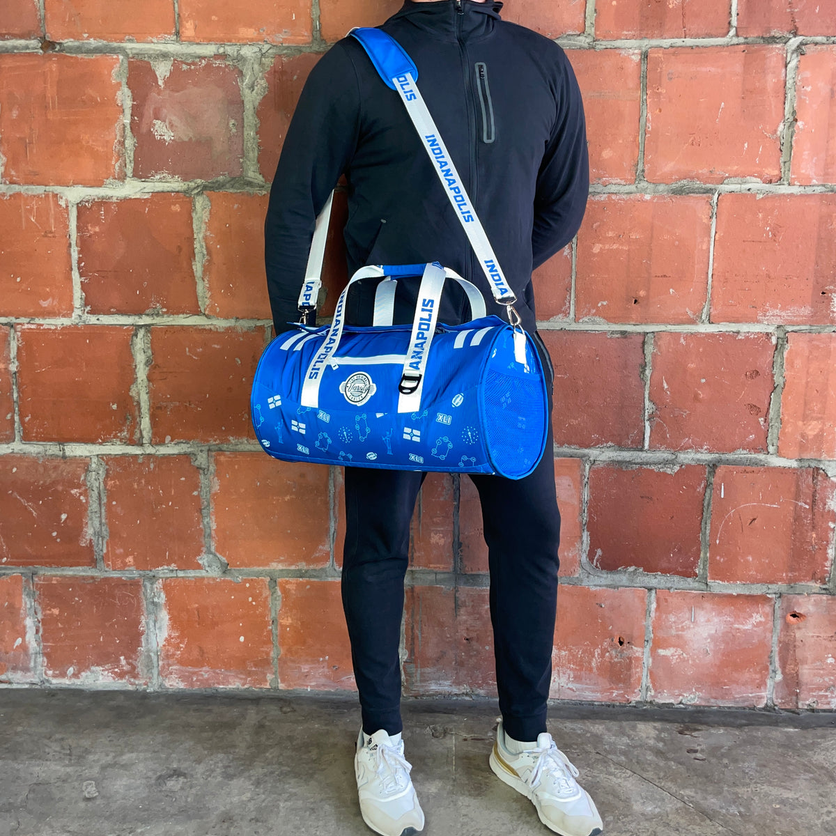 Man standing with Indianapolis Duffle Cooler Bag