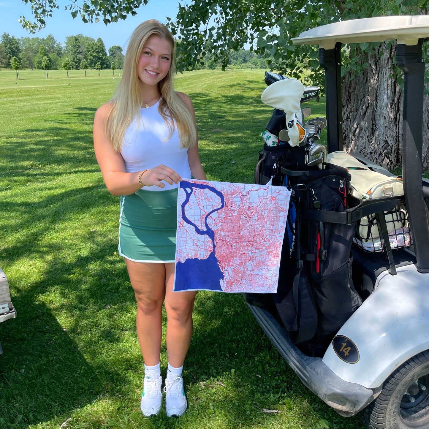 A lady standing with Magnetic Golf Towel - Buffalo