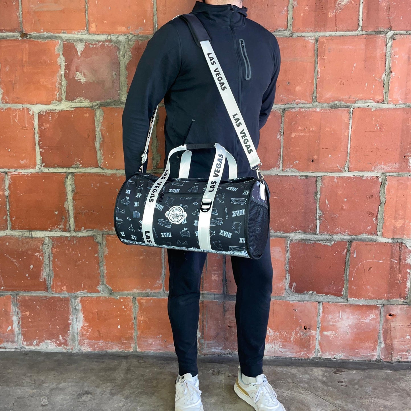Man standing with Las Vegas cooler duffle