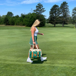 Women-Holding-cruiser-golf-course