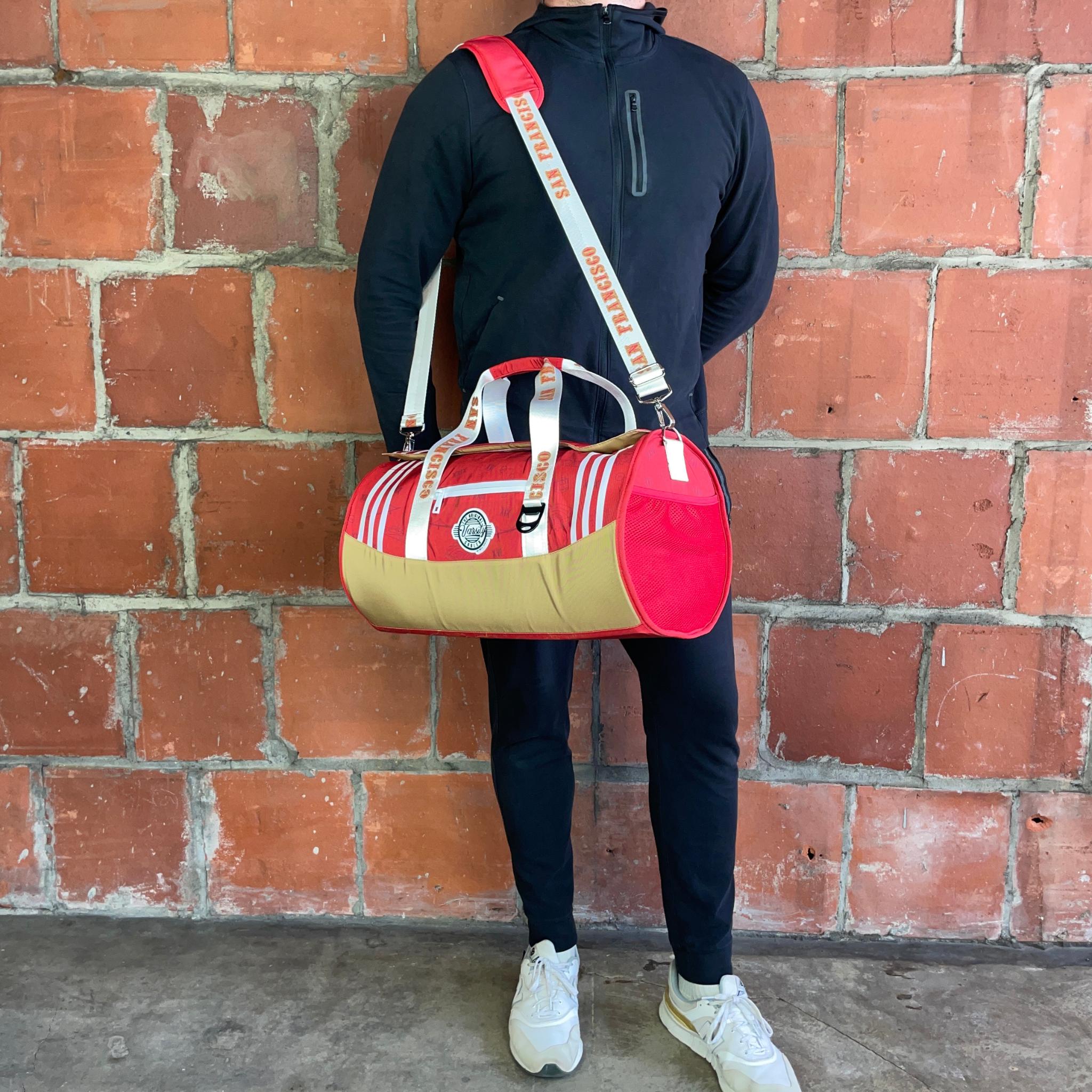 Man-standing-with-San-Francisco-duffle-cooler