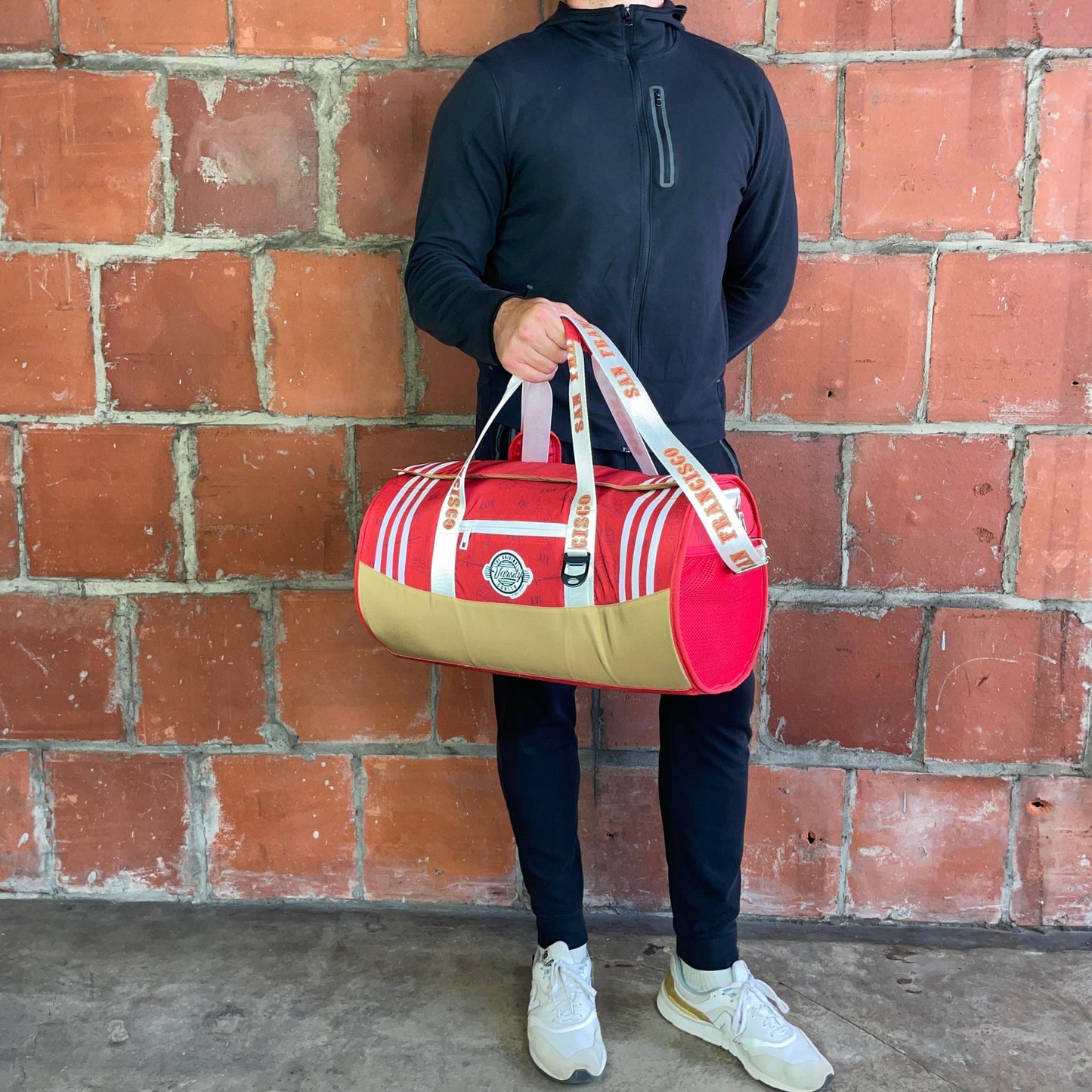Man holding with duffle cooler bag