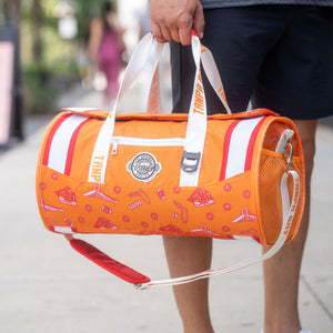Man-holding-carry-on-duffel-bag