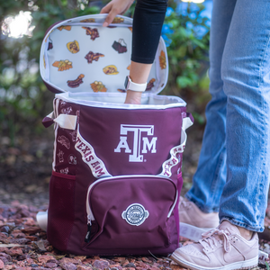 Women-Taking-Snacks-from-Inside-the-The-Texas-A&M-Backpack-Cooler