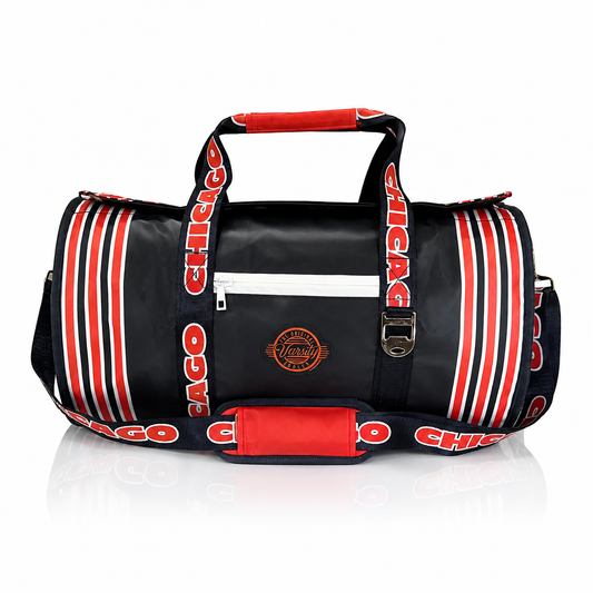 A navy Chicago Bears duffel bag with red and white striped handles, straps, and side panels, featuring a front zip pocket and a circular team logo patch.