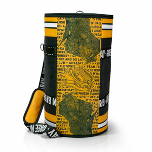 A-cylindrical-green-and-yellow-Packer's--themed-cooler-with-a-matching-shoulder-strap,-featuring-a-green-bay-silhouette-and-text-over-a-yellow-background.
