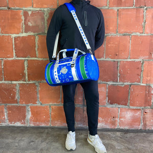A-Man-standing-with-Seattle-Duffle-Cooler