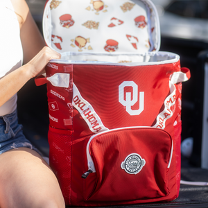 Girl-Opening-University-of-Oklahoma-Backpack-Cooler