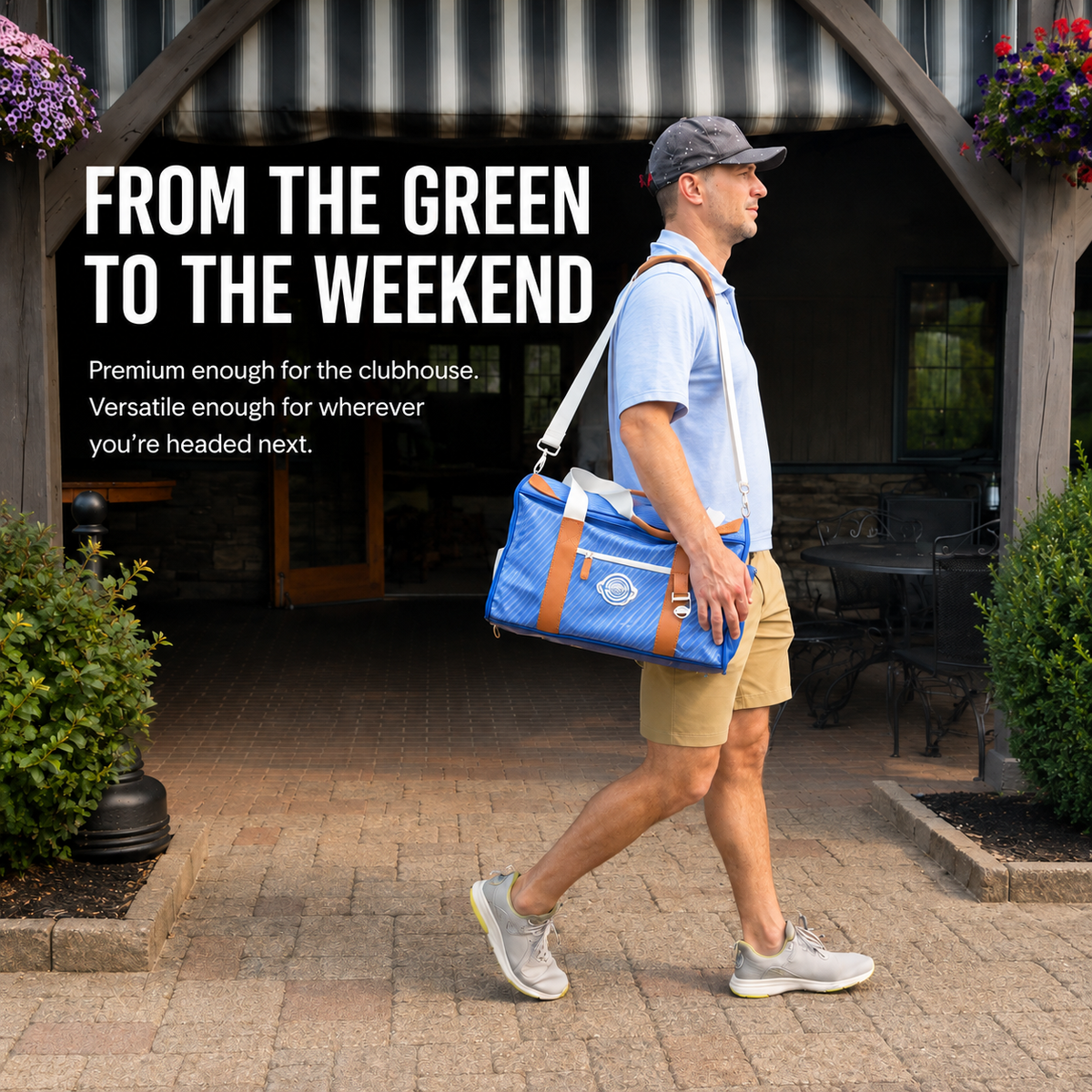 Golfer carrying the Course Cruiser outside the clubhouse as a premium cooler for the course, travel and weekends.